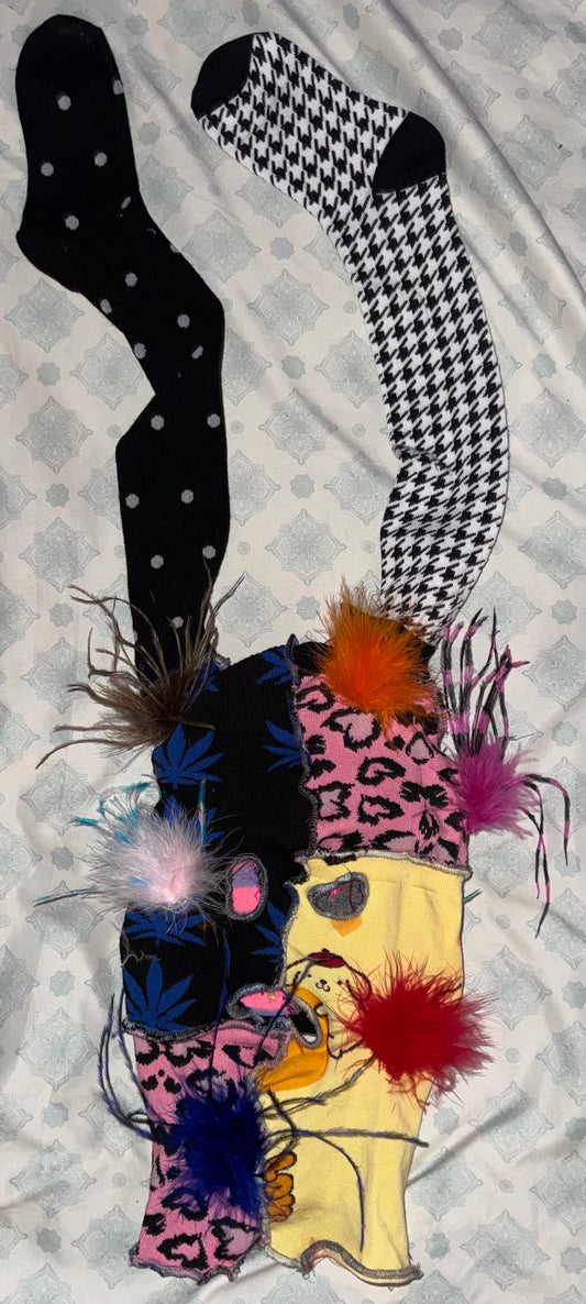 Sock mask with feather bits
