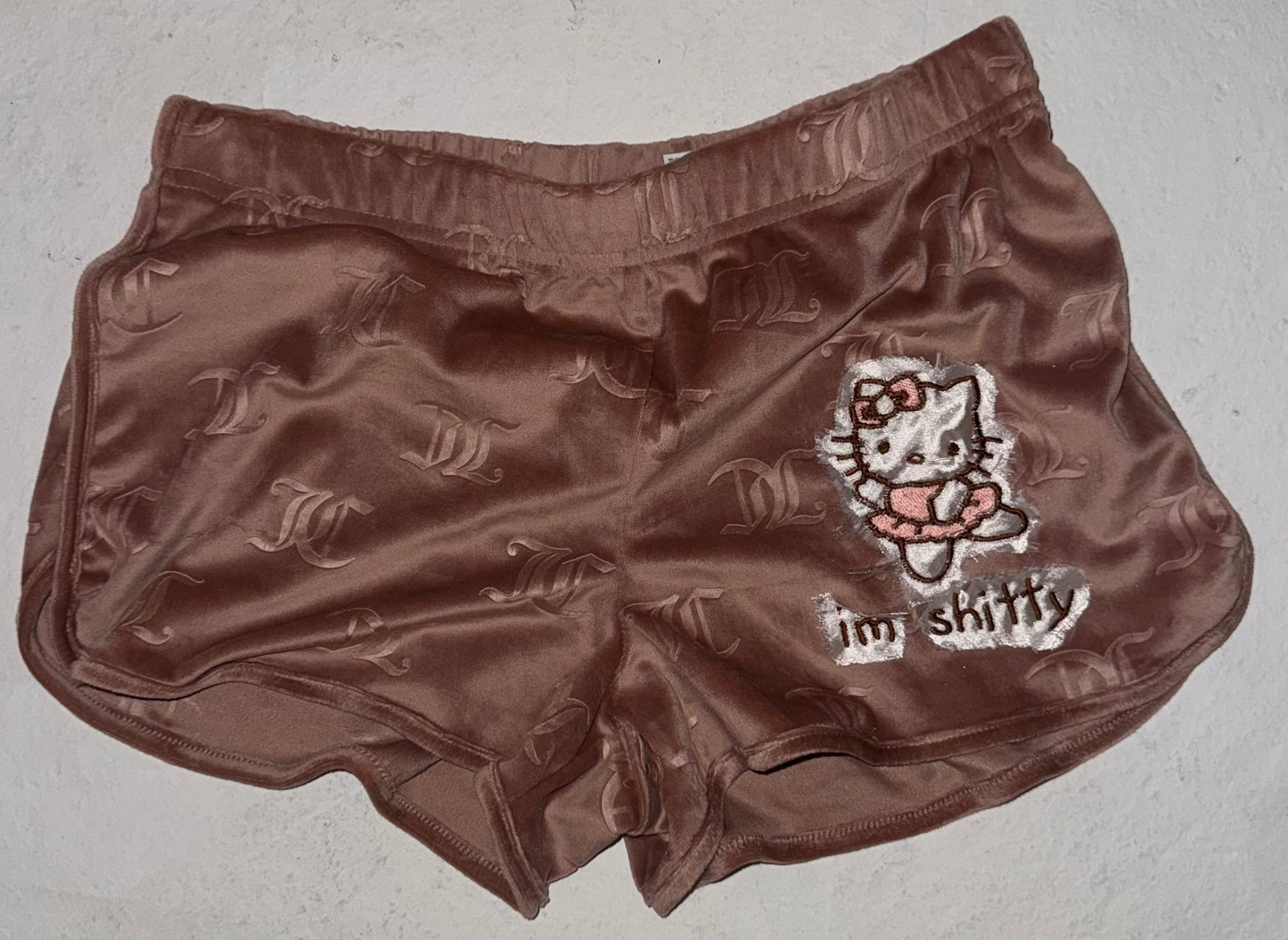I’m shitty juicy shorts M