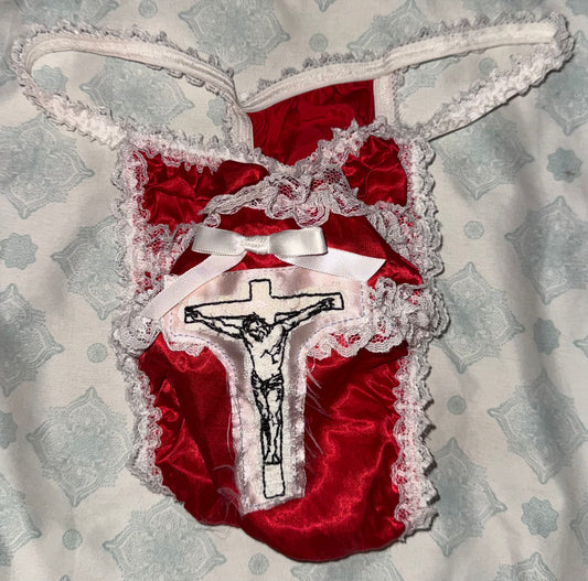 Person with package Jesus Christ on a cross hidden pocket lace thong M